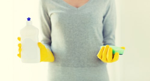 Technician wearing PPE during carpet cleaning work